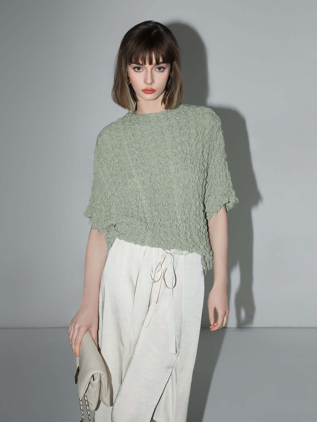 Textured Pleated Knit Batwing Top - Image 1